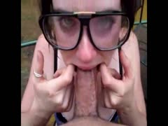 Nerdy busty chick sucking a homeless man's dick
